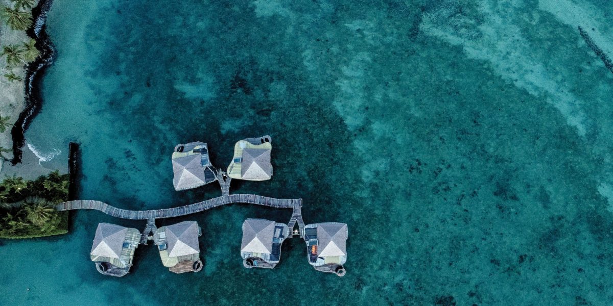 376417-overwater-fales-from-above-at-coconuts-beach-club-resort-spa-samoa-upolu