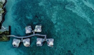 376417-overwater-fales-from-above-at-coconuts-beach-club-resort-spa-samoa-upolu